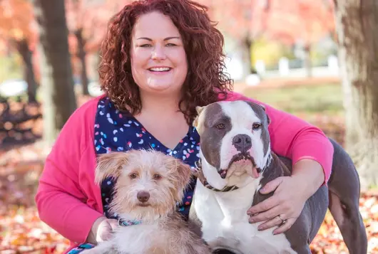 Jill with her two happy dogs